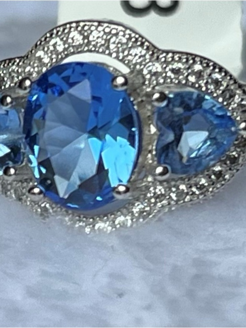 Charmed Aroma Blue Crystal Triple-Stone Halo Ring